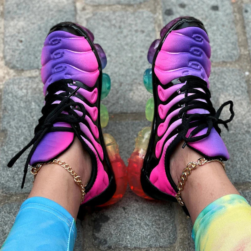 Unisex Captain Running Mesh Rainbow Sneakers with transparent soles and colorful design, showing the shoe's vibrant upper and clear bottom.