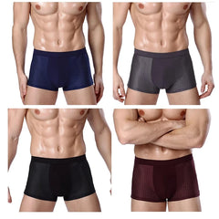 Four men wearing breathable mesh boxer shorts in blue, grey, black, and maroon.