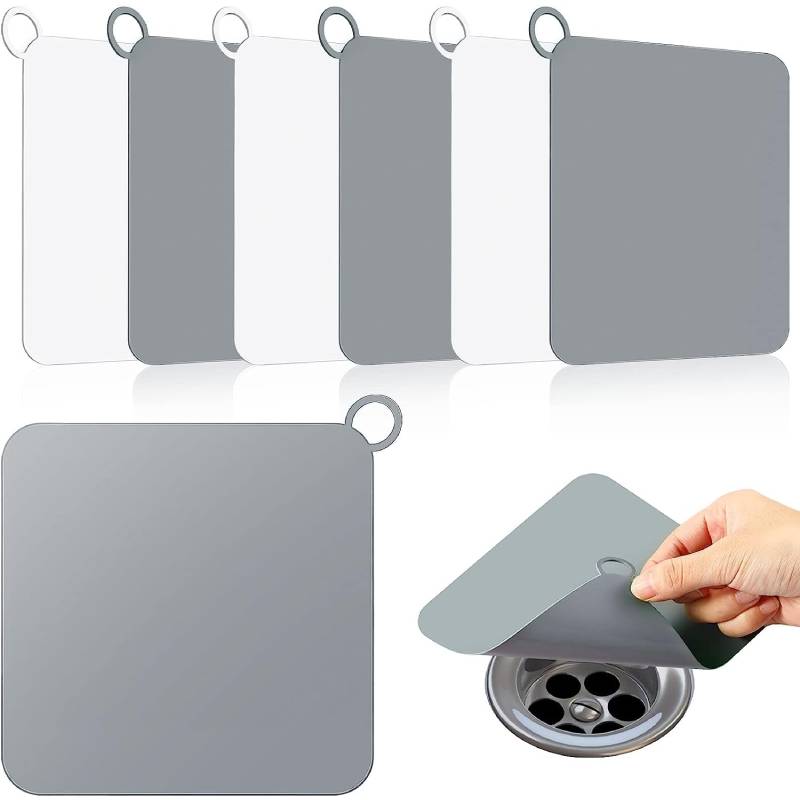 Showlu Smart General silicone drain stopper sitting in a kitchen sink, flexible and reusable for blocking water drainage.