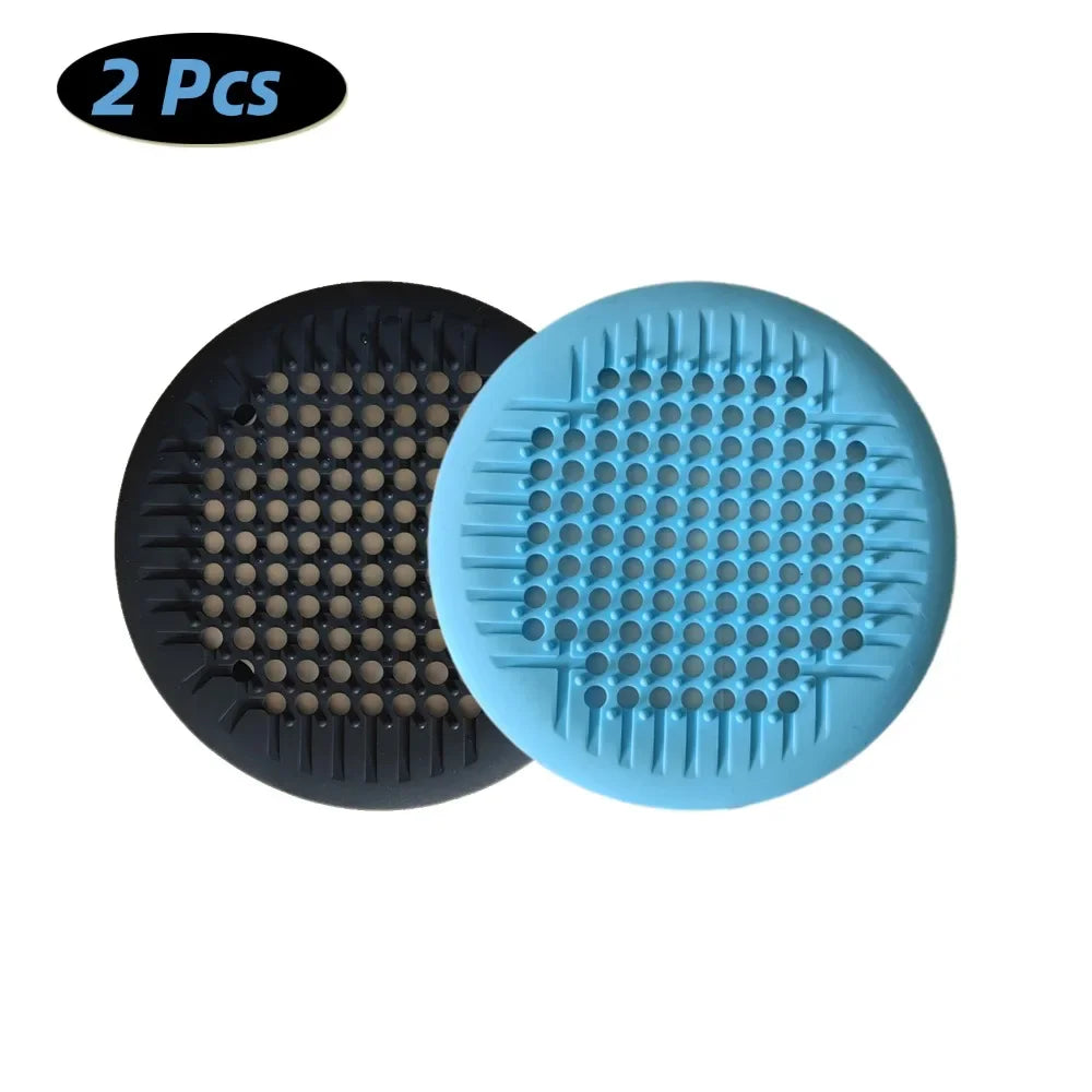 Showlu Smart General silicone drain cover preventing clogs, flexible kitchen sink protector with small holes for water flow.