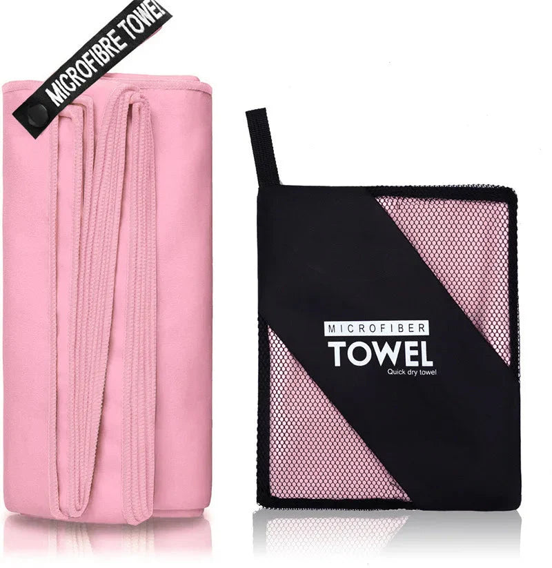SHOWLU quick-drying microfiber sports towel for gym, swimming, and beach, shown folded with soft, absorbent fabric visible.