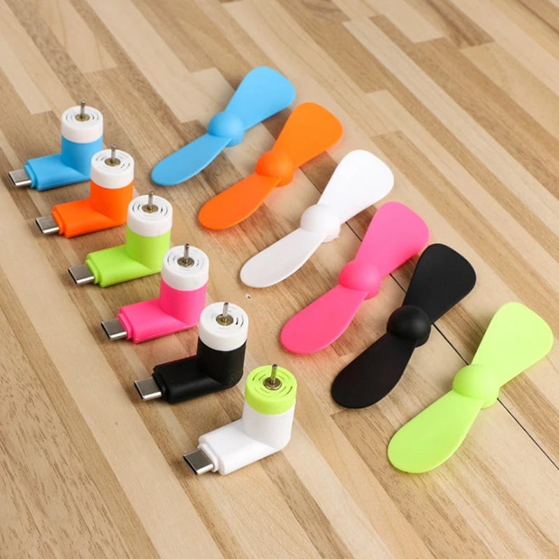 Showlu Smart General USB mini fan with compact design and adjustable blades for portable cooling.