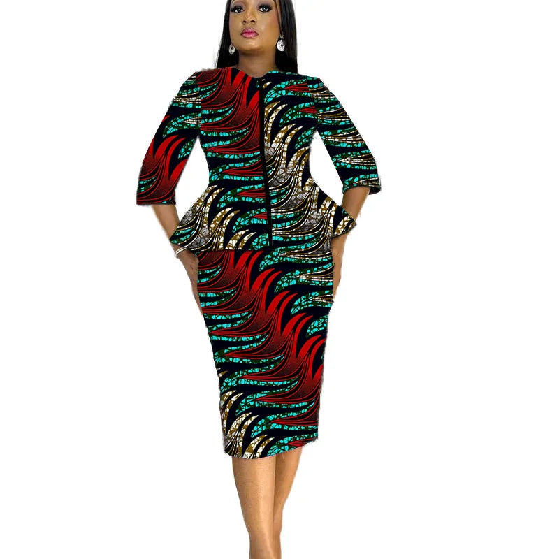 African print women's party outfit featuring a tailor-made blouse and matching skirt set, vibrant and stylish for special occasions.
