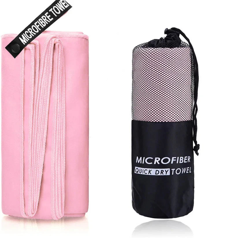 SHOWLU microfiber sports towel for gym, swimming, and beach, quick-drying fabric, shown folded with vibrant color options