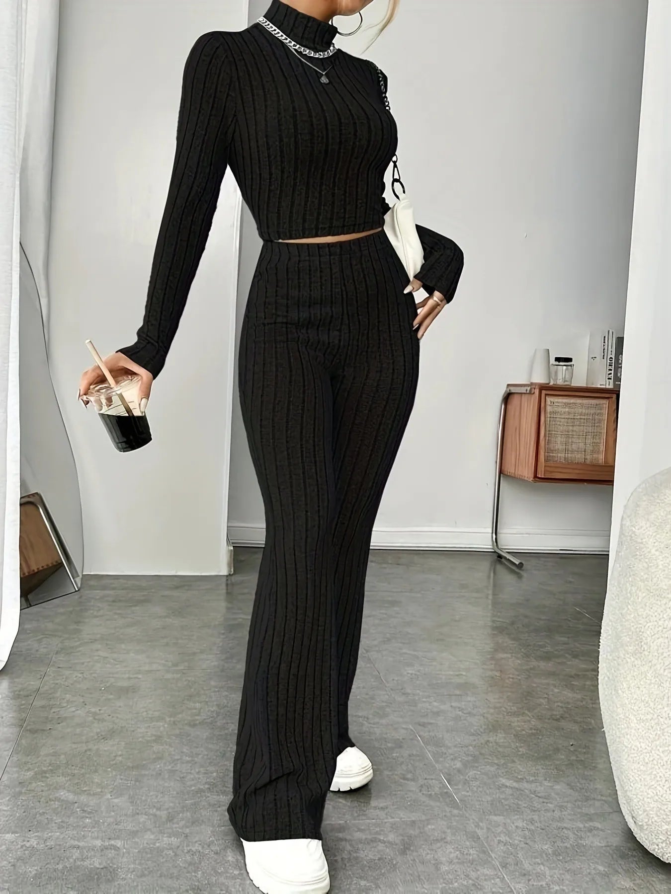 Autumn knitted two-piece women's bodycon suit with long sleeves, crop top, and flare pants, stylish vintage Y2K stretch outfit.