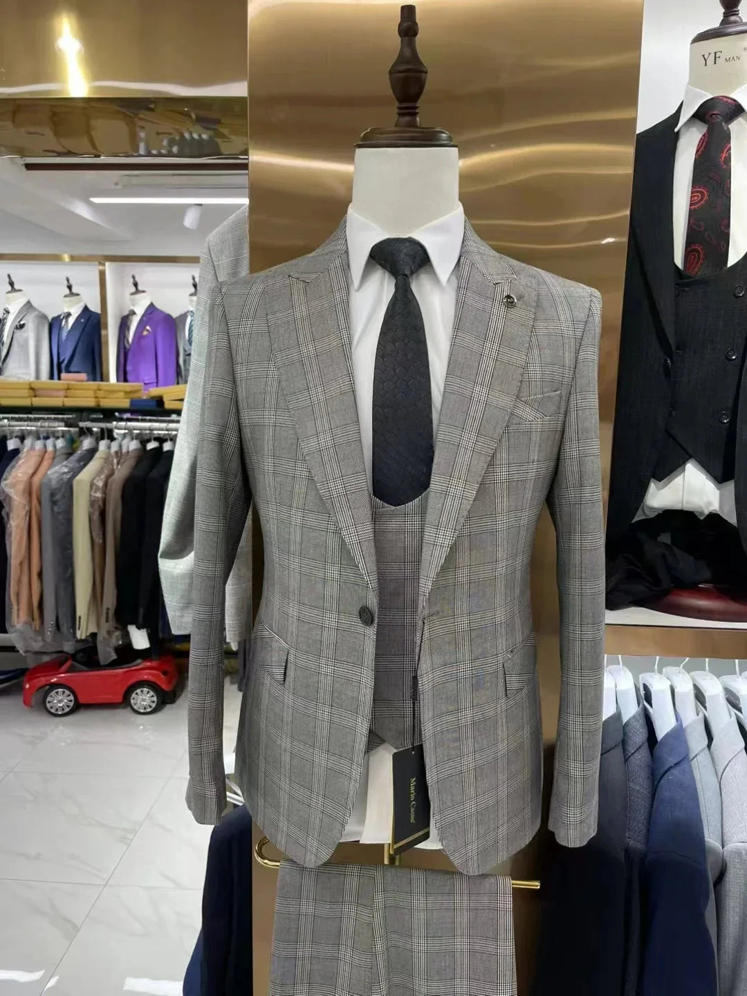 SHOWLU grey plaid 3-piece men's suit with slim fit, formal wedding tuxedo, featuring tailored blazer, vest, and matching trousers.