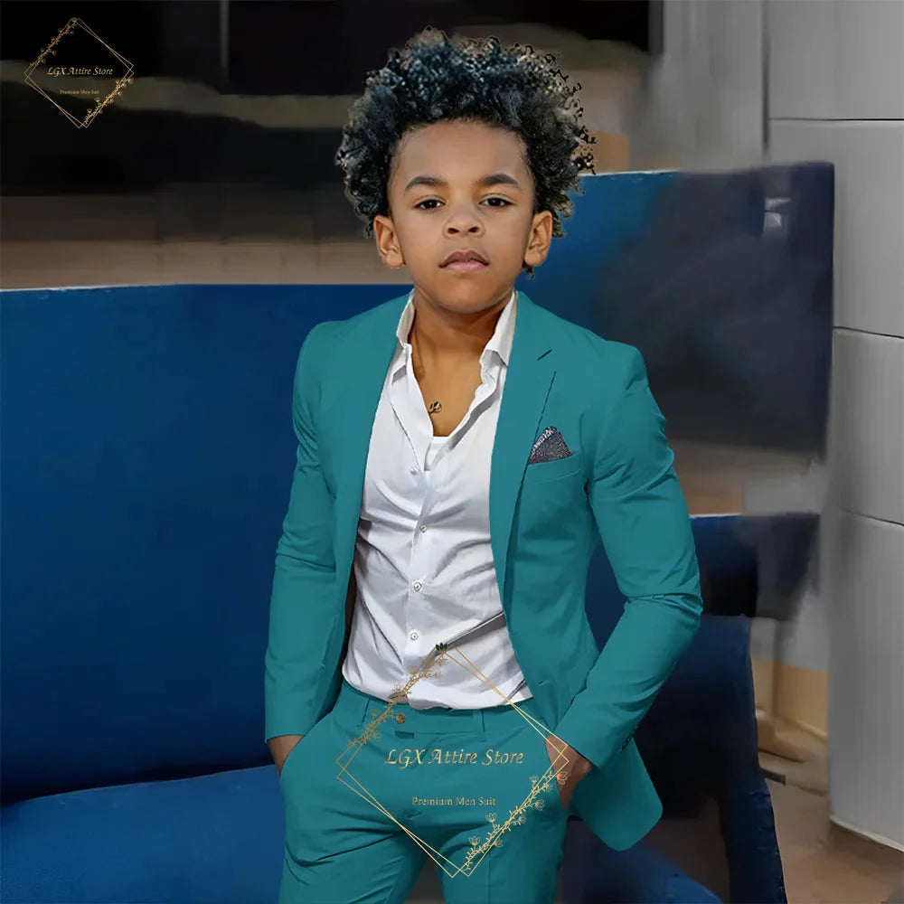 Orange slim fit boys' 2-piece suit with single-breasted twill jacket and matching trousers, stylish and tailored for young boys.