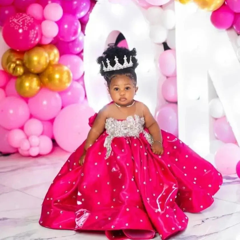 Pink satin flower girl dress for kids, floor length with puffy skirt, ideal for weddings, birthdays, and first communions.