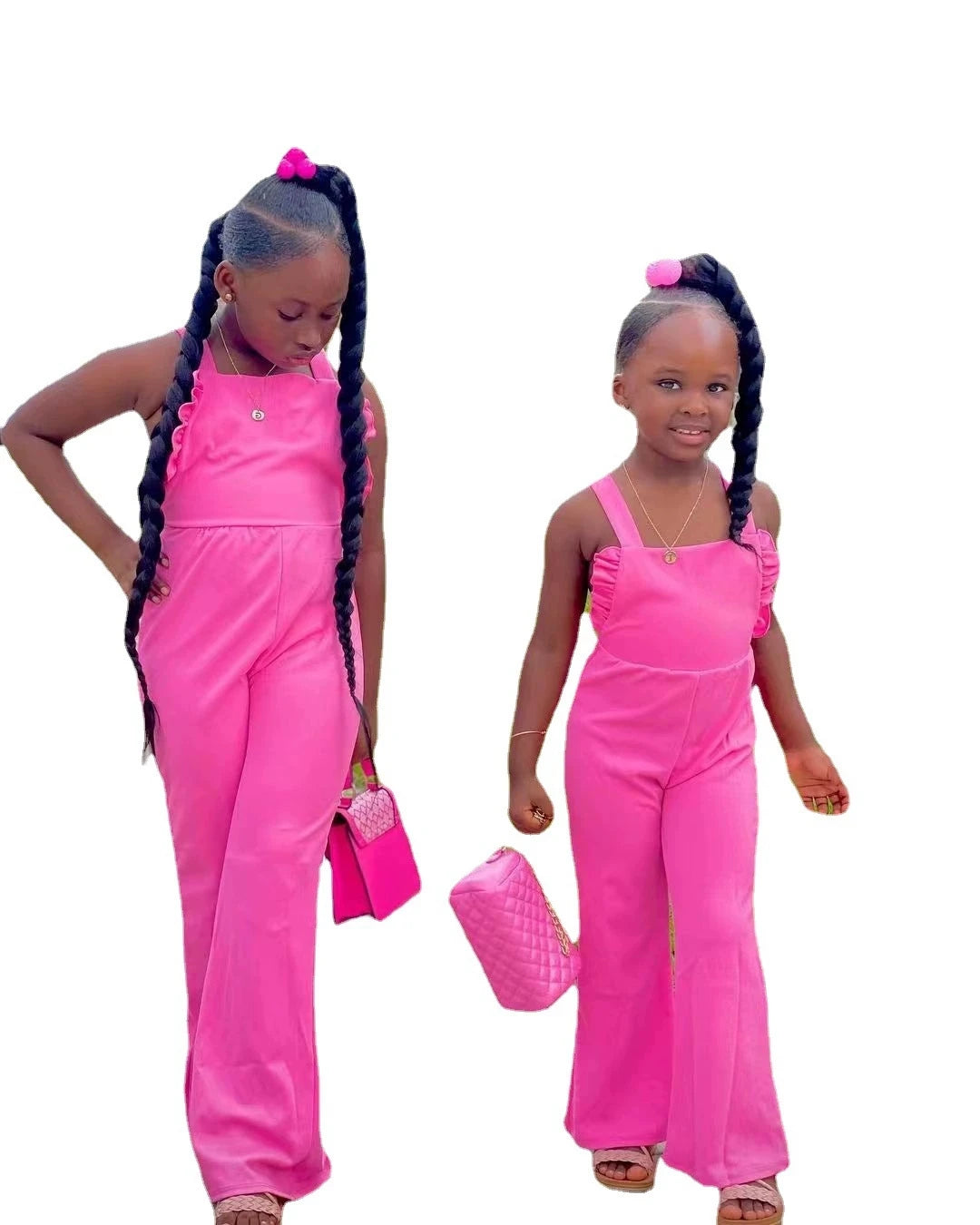 Young girl wearing Showlu Fashion's YTYIN summer cotton jumpsuit, casual beach outfit for kids ages 2-7, front view with bright background.