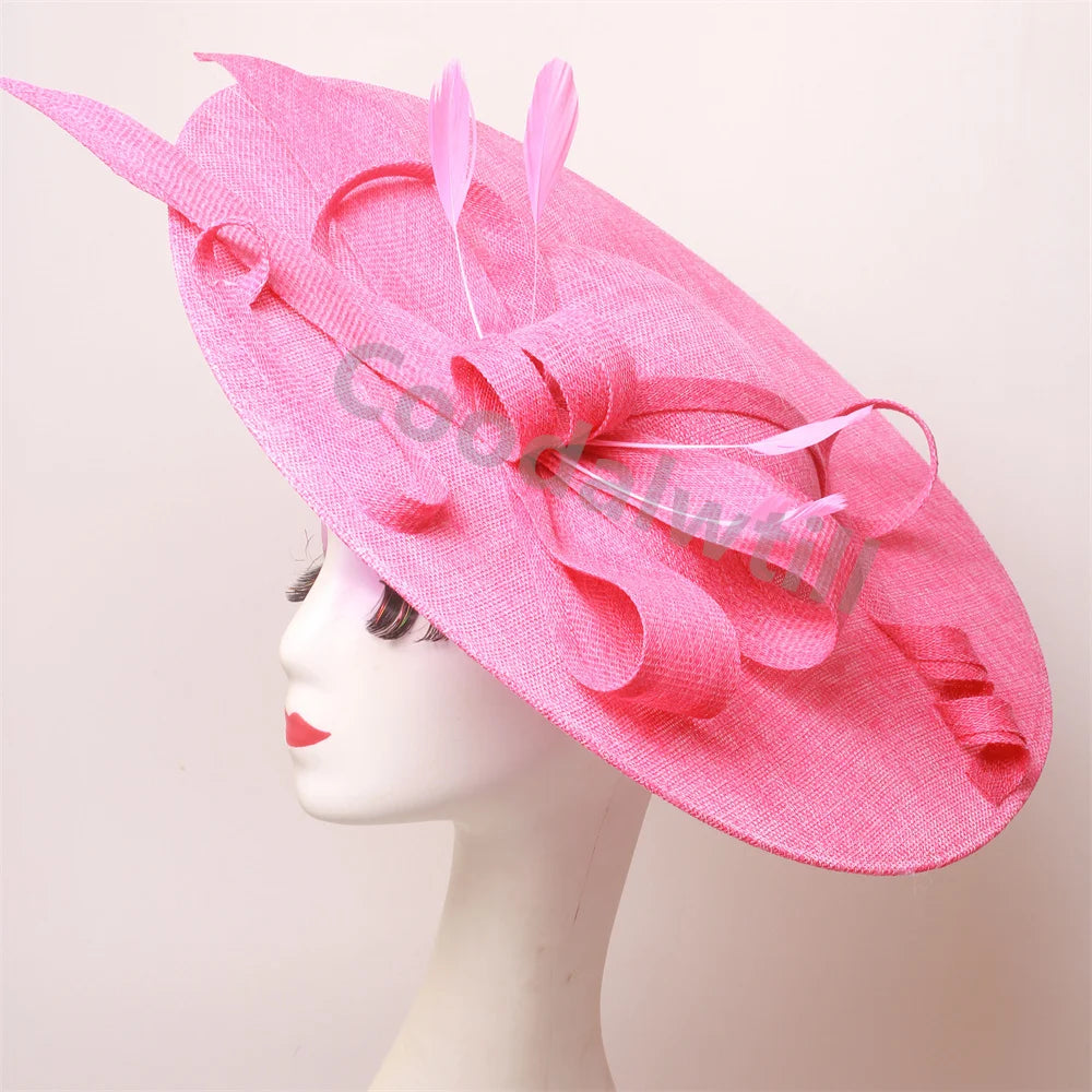 Pink Derby fascinator hat headband with large elegant wedding and race millinery cap for women, suitable for bridal and formal occasions.