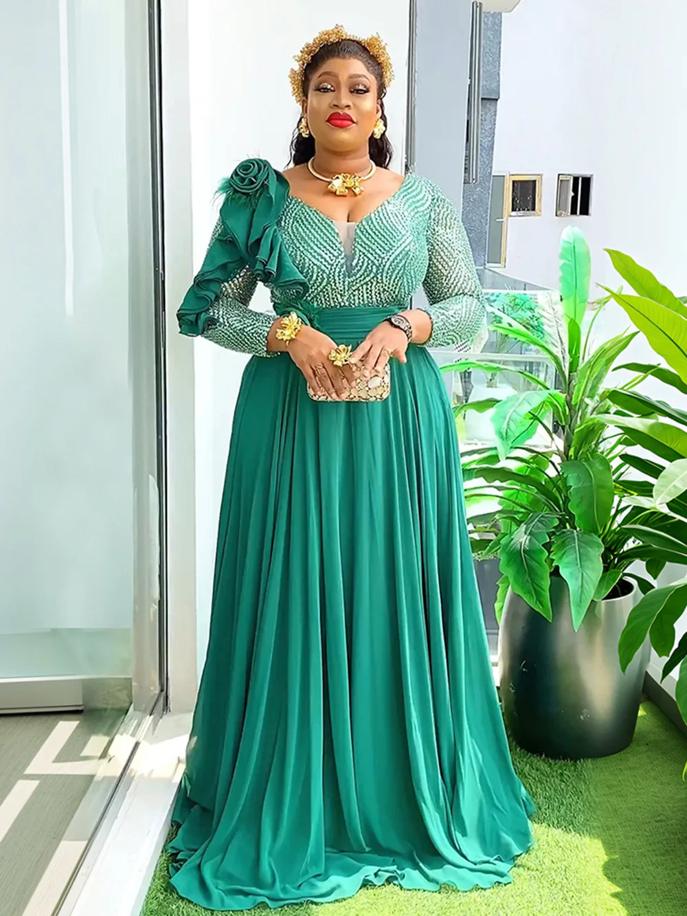 Elegant African women's dress featuring a long dashiki-style Ankara outfit, perfect for weddings and parties, by Showlu Fashion.