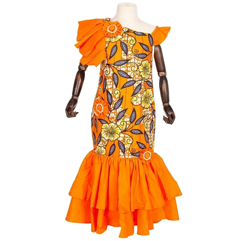 African print girls' dashiki mermaid dress made of cotton, featuring vibrant patterns and a fitted party gown style.