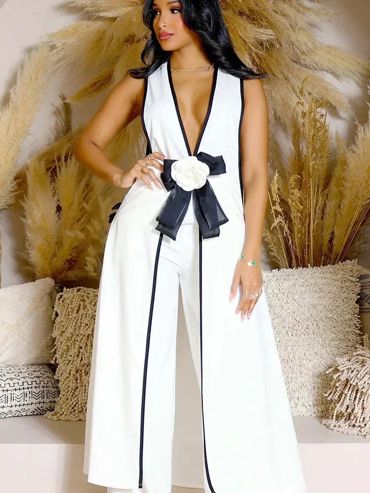 Doyerl women's V-neck bow tie top and wide-leg pants two-piece set, shown in black, styled for casual or semi-formal wear