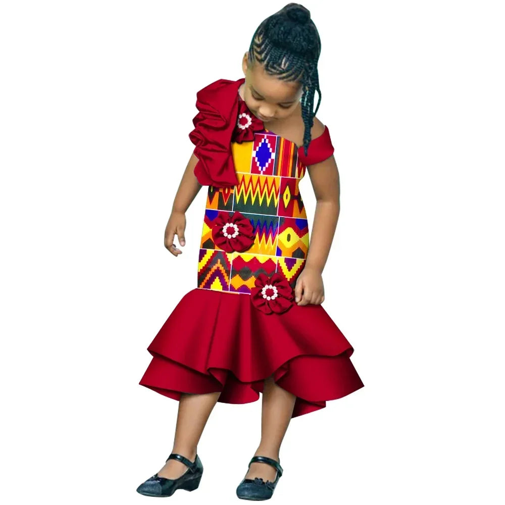 Colorful African print girls' dashiki mermaid dress made of cotton, featuring vibrant patterns and a stylish party gown design.