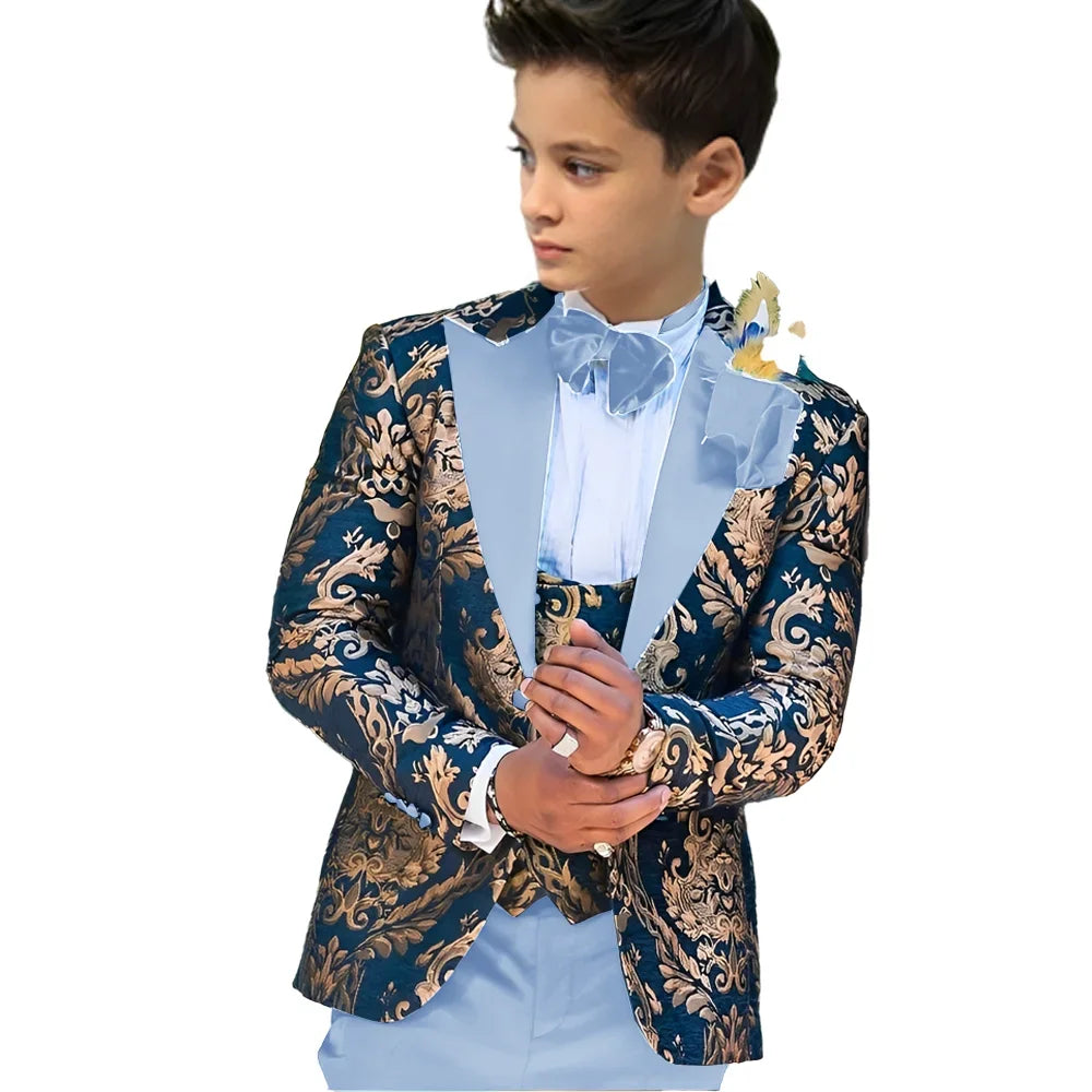 Children's floral boys' wedding suit by Showlu Fashion, featuring a tuxedo jacket, vest, and pants for ages 2-16.