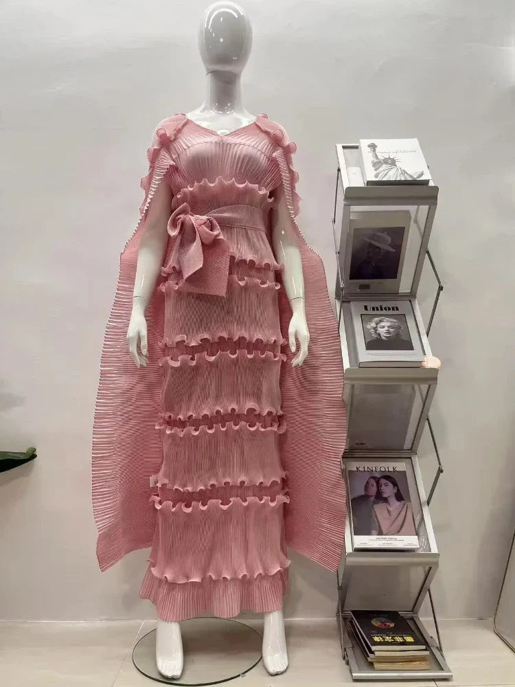 Women's loose V-neck sleeveless Miyake pleated cake dress by SHOWLU FASHION STORE, featuring elegant pleats and a flowing silhouette.