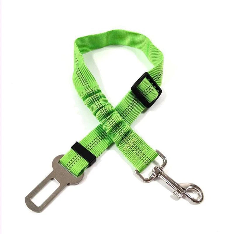 Showlu Smart General pet car seatbelt harness attached to a dog, securing the pet safely in a vehicle for travel.