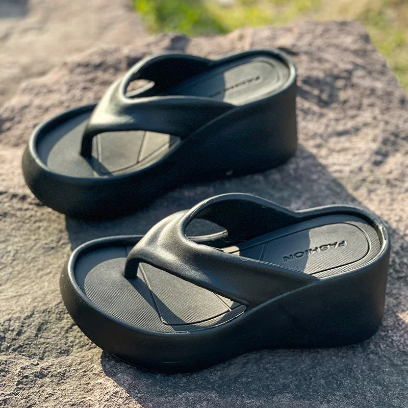 SHOWLU Women's platform wedge flip flops with thick EVA soles, stylish summer sandals featuring open toe design and adjustable straps.