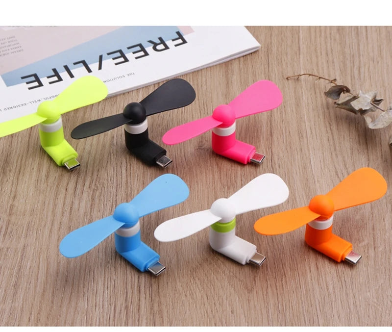 Showlu Smart General USB Mini Fan with compact design and adjustable settings, ideal for personal cooling on the go.