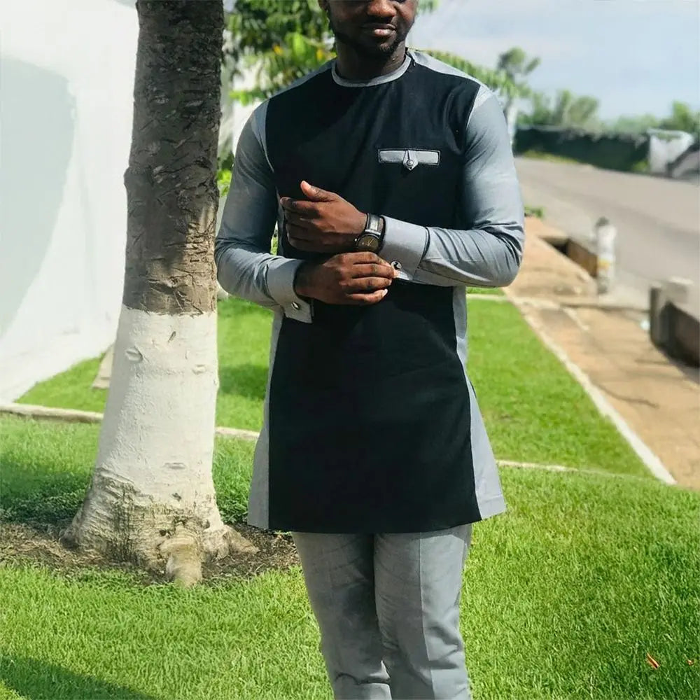 Men's traditional African Kaftan set with dashiki design, featuring vibrant patterns and comfortable fabric, by SHOWLU FASHION STORE.