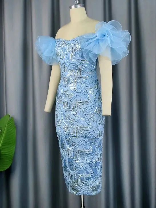 Elegant Nittonic off-shoulder sequin evening gown with floral embroidery and midi length, perfect for formal occasions.