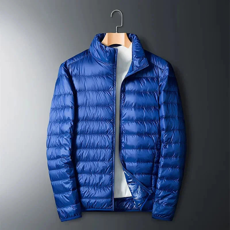 SHOWLU Men's ultra-light white duck down jacket, waterproof padded coat with a sleek design and quilted insulation.