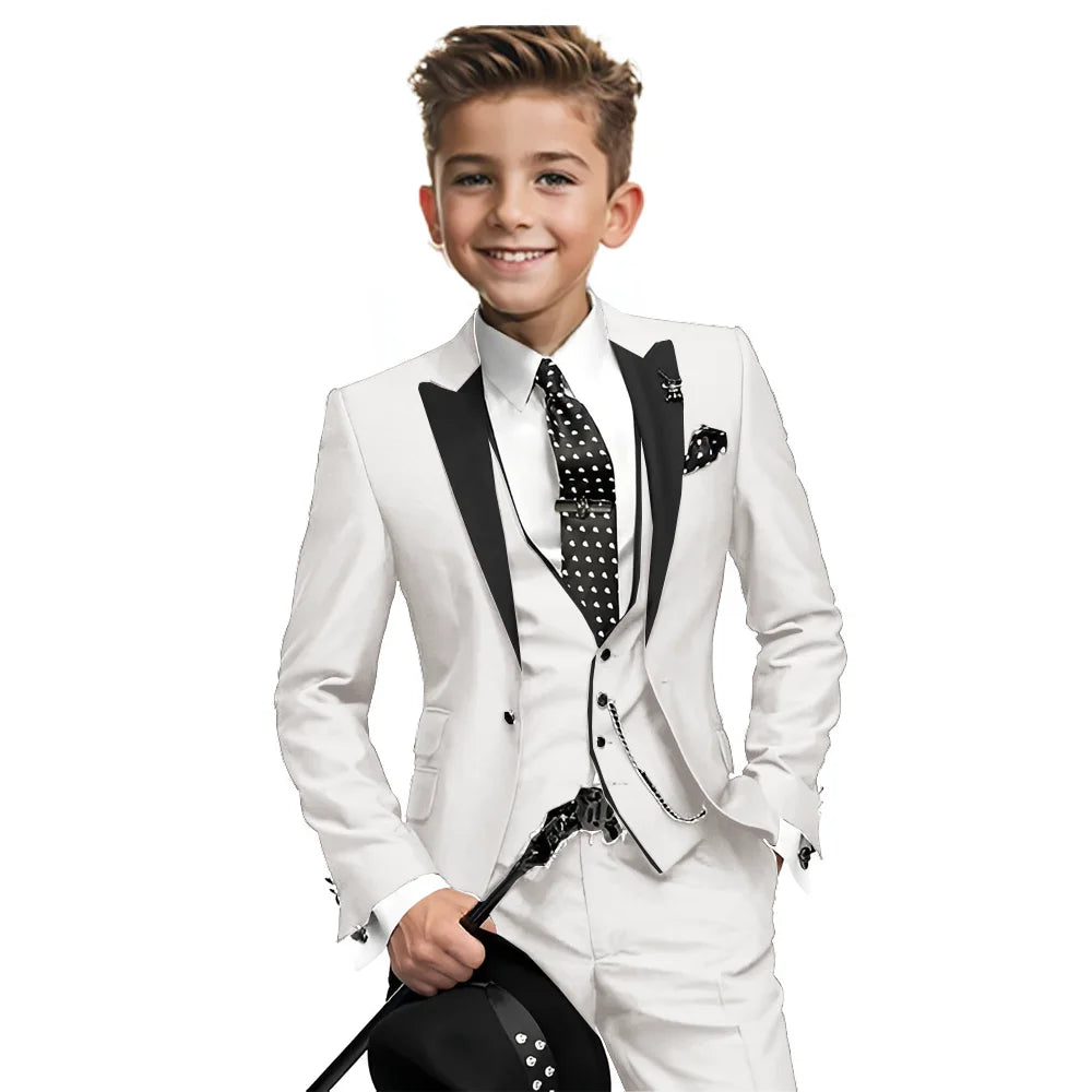 Navy blue boys tuxedo 3-piece suit with blazer, pants, and vest, suitable for formal occasions and weddings, sizes 2-16 years.