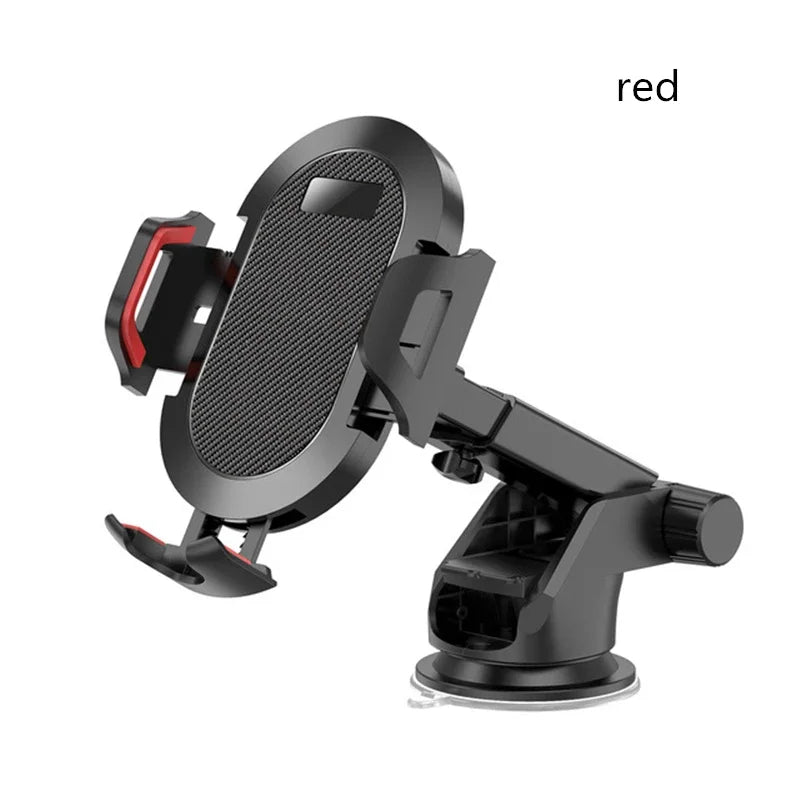 Universal AUFU Gravity Sucker Car Phone Holder mounted on windshield, showcasing adjustable grip and secure suction cup for smartphones.