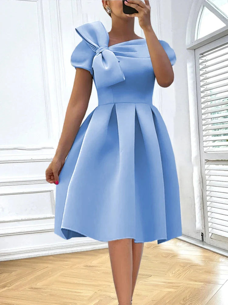 Aime Women's Bow A-Line Skater Dress by SHOWLU FASHION STORE, elegant scuba fabric party gown with a bow detail and flared skirt.