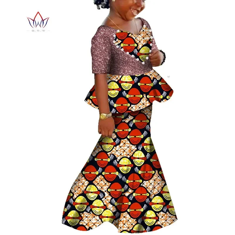 African Dashiki print cotton girls dress from BintaRealWax, featuring vibrant summer fashion with traditional patterns and comfortable fit.