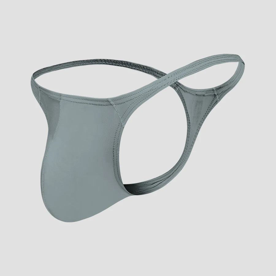 Showlu men's low-rise solid nylon thong underwear with breathable, stretchy fabric, designed for comfort and a sleek fit.