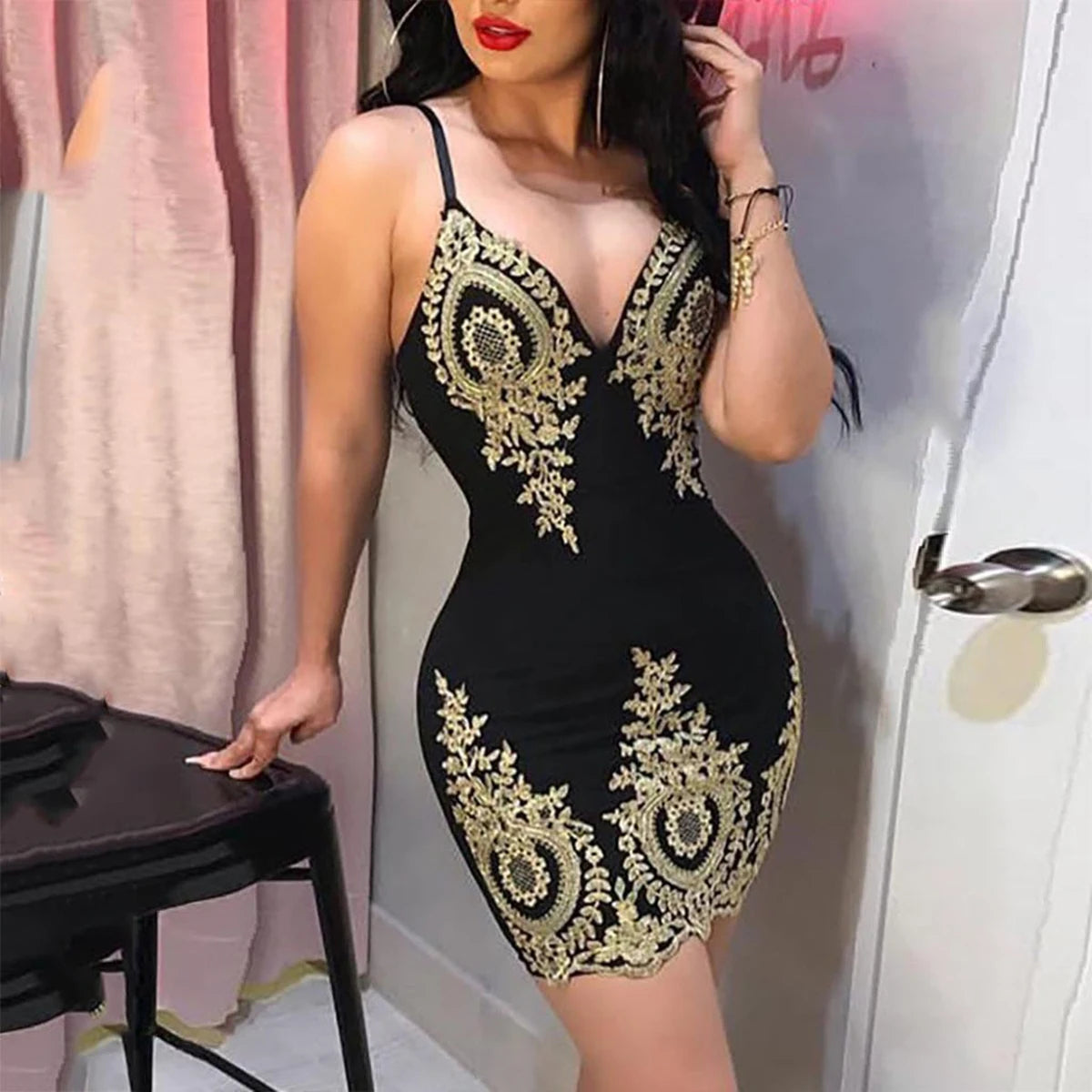 Sexy summer party halter dress by Showlu Fashion Store, sleeveless slim-fit mini dress with low neckline and halter back detail.