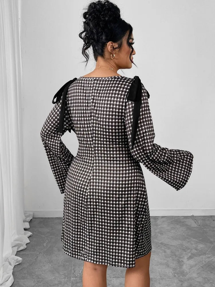 Kresima women's grid print slim fit pencil dress with O-neck and long sleeves, showcasing a stylish and modern design.