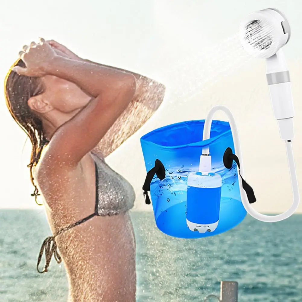 Showlu Smart portable camping shower with rechargeable electric pump, LED light, compact design, ideal for outdoor use