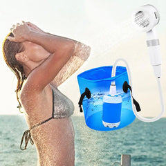 A portable electric camping shower with a pump submerged in a blue bucket and a handheld sprayer.