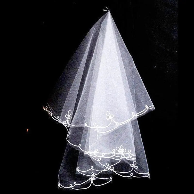 Showlu two-layer white tulle wedding veil with comb, shoulder length, bridal accessory for wedding or marriage ceremonies.