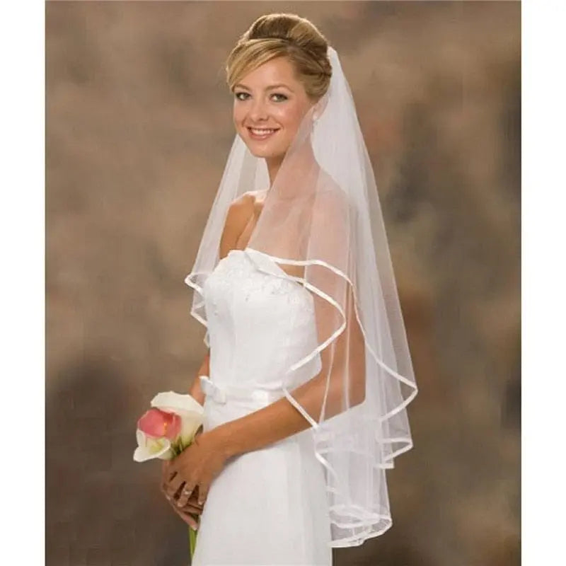 Showlu two-layer shoulder-length tulle wedding veil with comb, white ivory bridal accessory for marriage or wedding ceremonies.