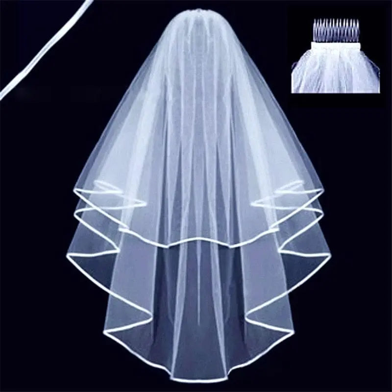 Showlu two-layer shoulder-length tulle wedding veil with comb, white ivory bridal accessory for marriage and wedding ceremonies.