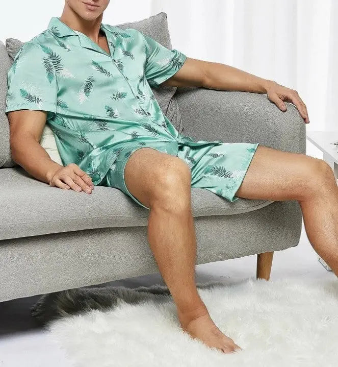 Men's short sleeve pajamas set in polyester with matching shirt and pants, perfect for comfortable summer sleepwear.