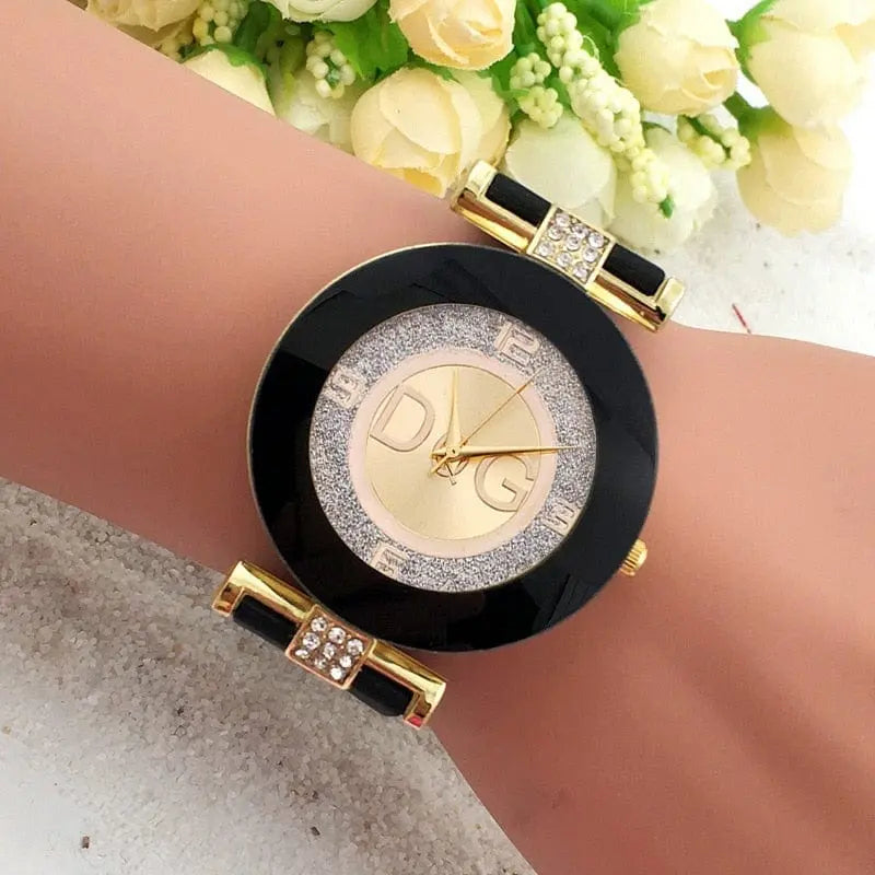 Black and white minimalist women's quartz wristwatch with a large dial and silicone strap by Showlu Fashion Store.