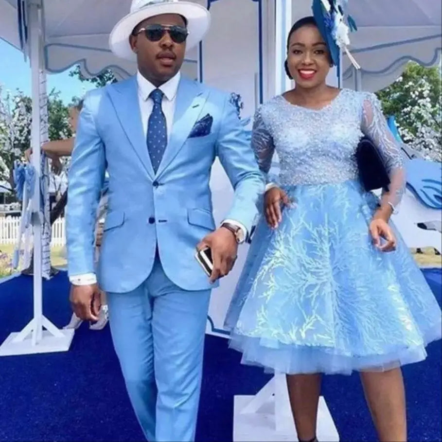 Sky blue men's 2-piece slim fit wedding suit with peak lapel and two-button blazer, shown with matching pants, from Showlu Fashion.