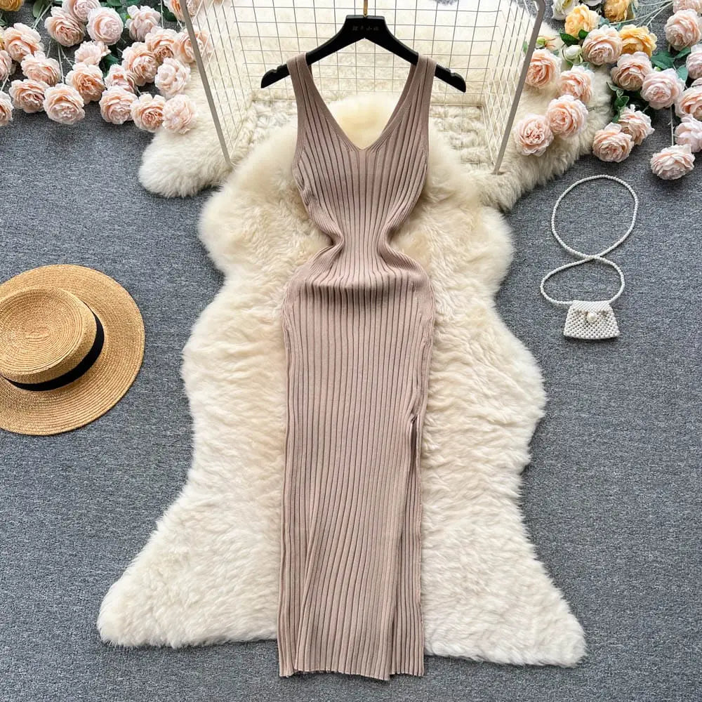 Showlu Fashion women's knitted bodycon summer dress with side split, fitted design, and sleeveless style for warm-weather wear.
