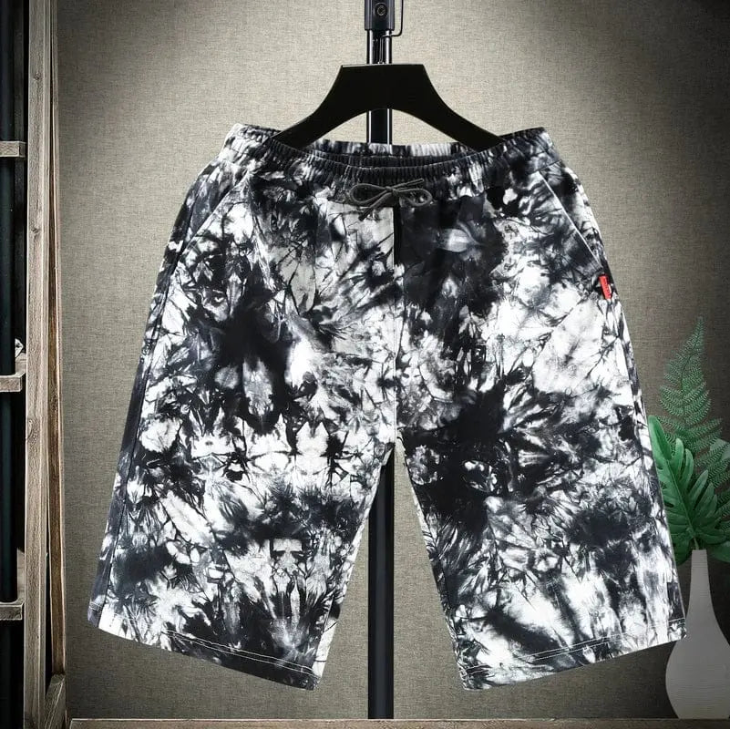 Showlu men's plus size tie-dye cotton shorts with a loose fit, designed for 10XL, featuring a colorful, casual style.