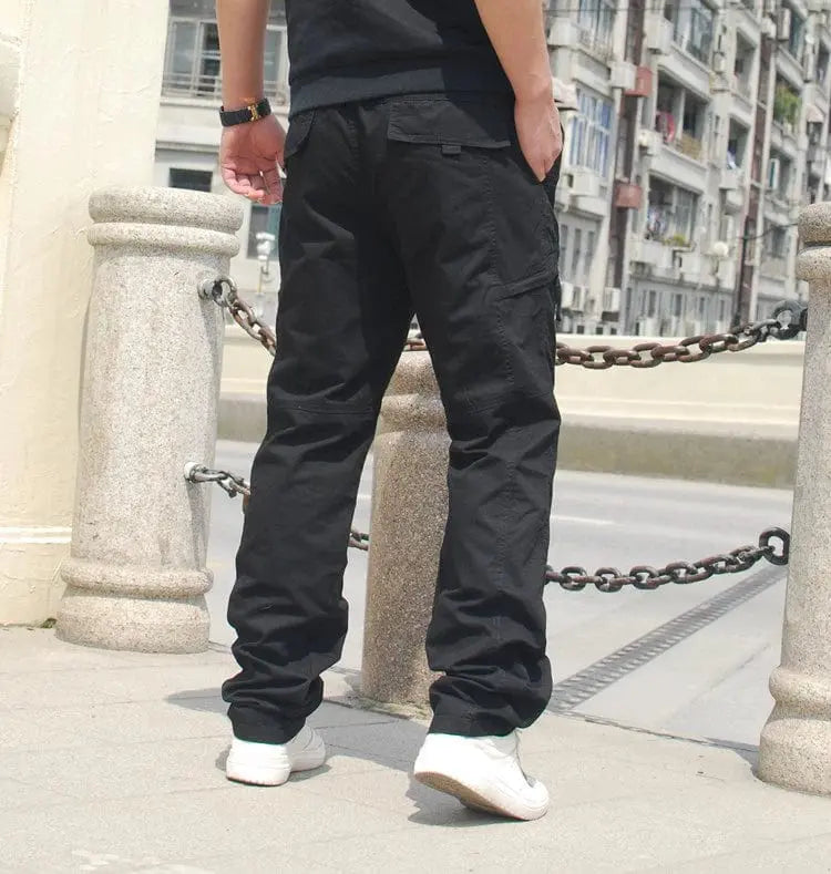 Showlu Fashion men's 100% cotton multi-pocket casual outdoor pants with elastic waistband, suitable for spring outdoor activities.