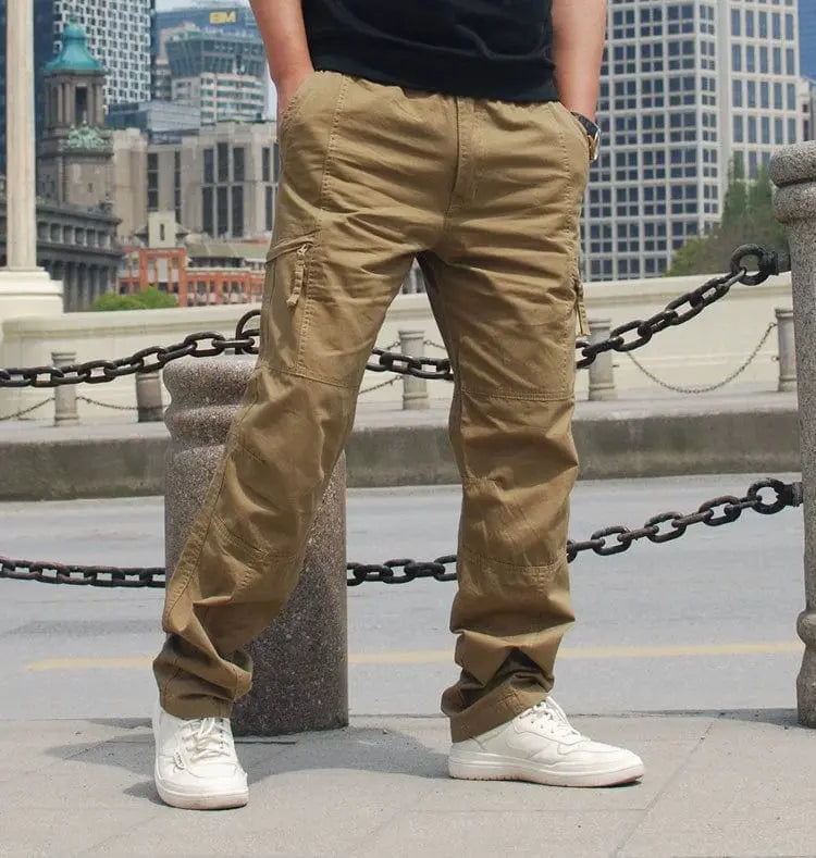Men's cotton casual outdoor pants with multiple pockets and elastic waist from Showlu Fashion, ideal for spring outdoor activities.