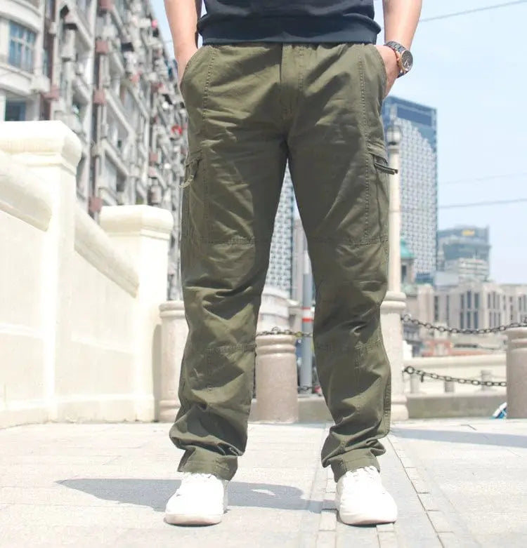 Men's cotton casual outdoor pants with multiple pockets, elastic waist, from Showlu Fashion, suitable for spring and outdoor activities.