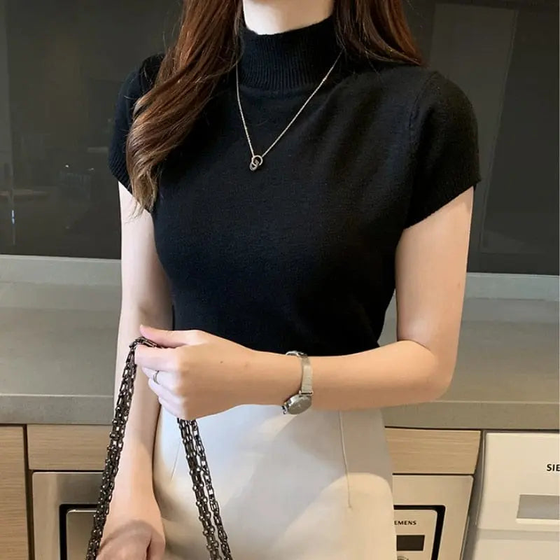 Slim fit knitted crop top for women by Showlu Fashion featuring short sleeves and casual cotton fabric, perfect for spring and summer.