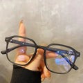 Showlu Square Polygon Blue Light Blocking Glasses with unisex plastic frame, featuring blue lenses for eye protection and stylish wear.
