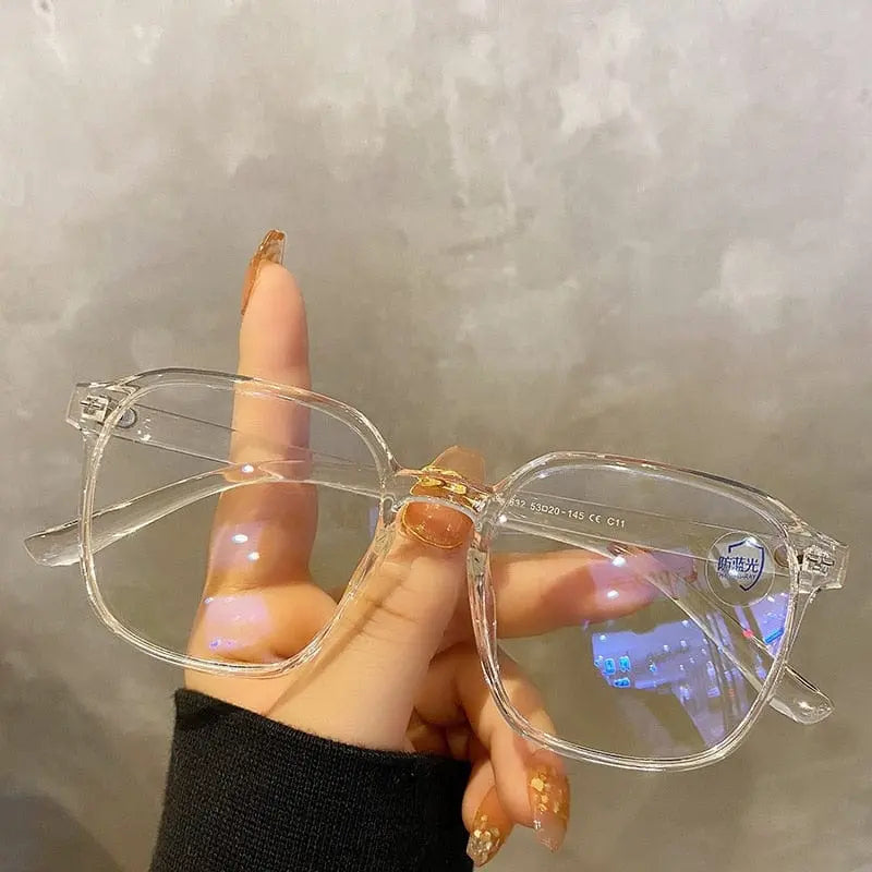 Showlu Square Polygon Blue Light Blocking Glasses with unisex plastic frame, featuring blue lenses and modern fashion design.