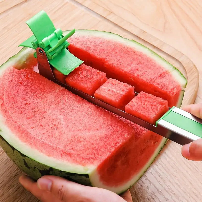 Showlu stainless steel watermelon slicer with windmill shape design, a versatile kitchen fruit and salad cutter tool.